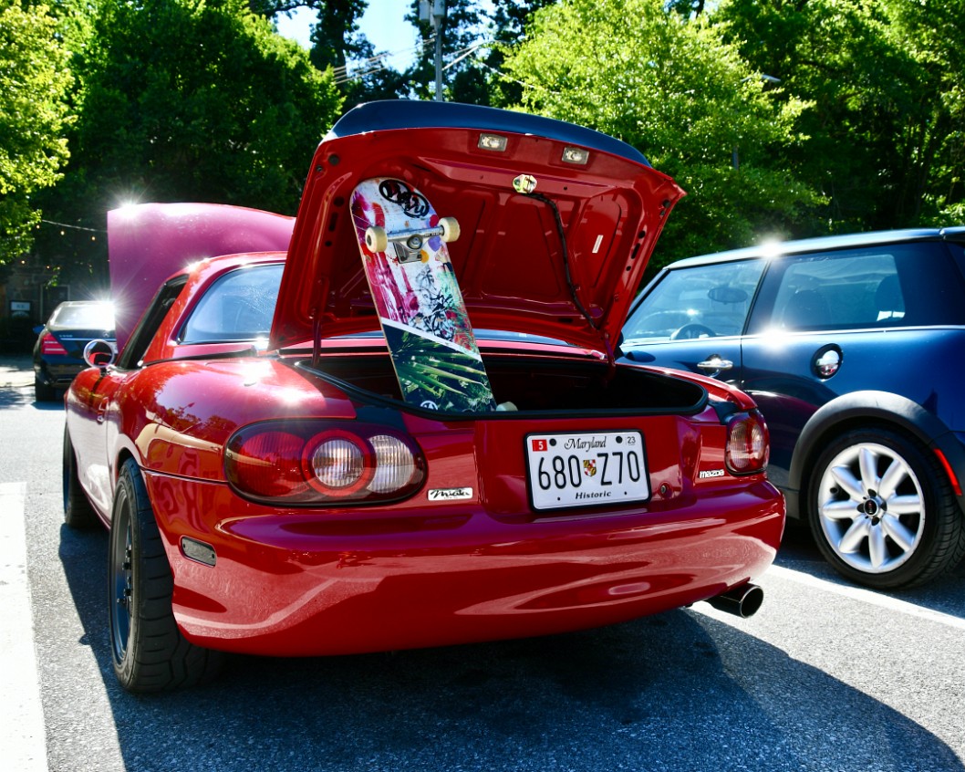 Rear Side View of a Red Mazda Miata