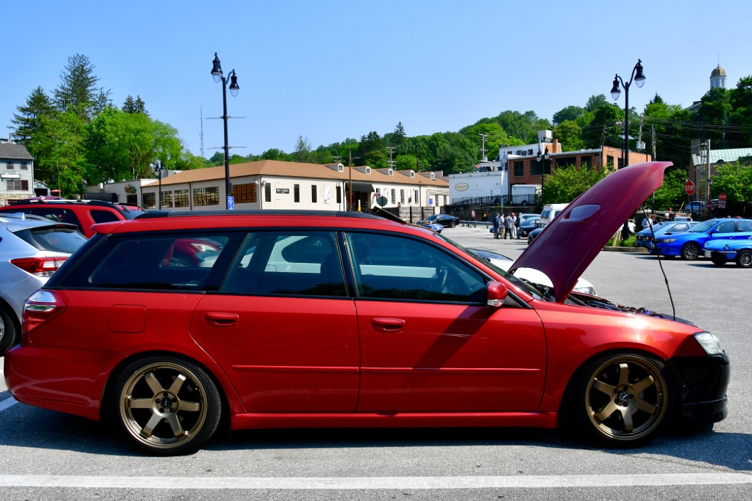 Side View of a Red Subaru Legacy