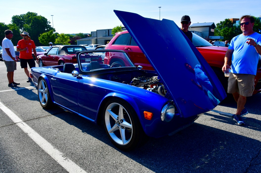 A Triumph With a Cobra Engine Inside and American Wheels