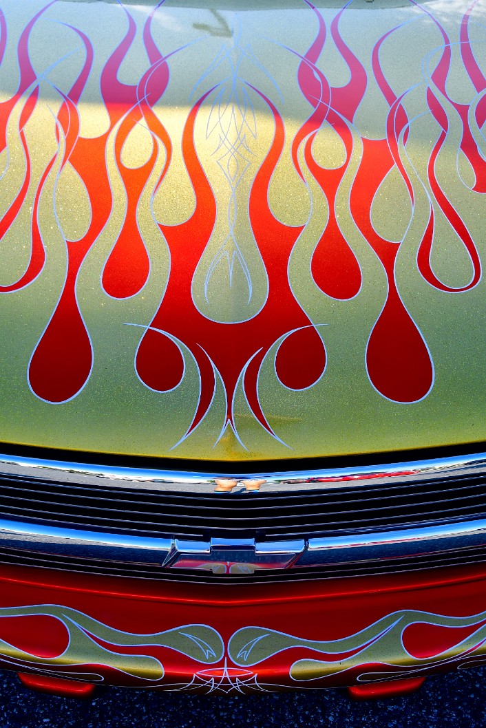 Fire and a Chevy Badge