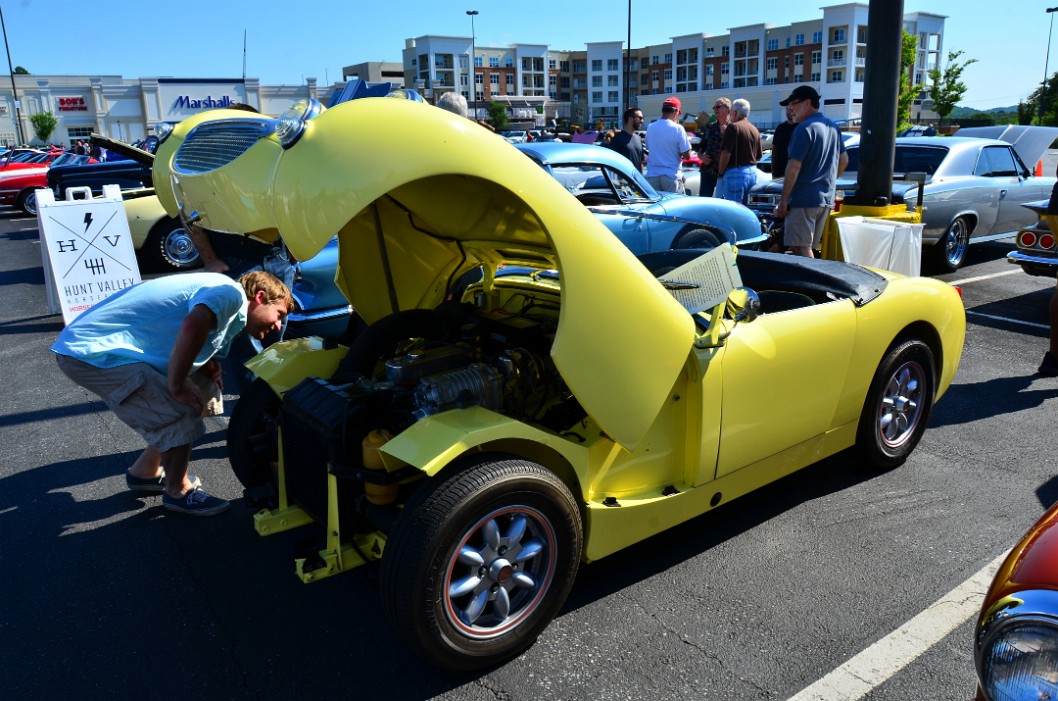 Checking Out a 1958 Austin Healey Bugeye Sprite in Bright Yellow Checking Out a 1958 Austin Healey Bugeye Sprite in Bright Yellow