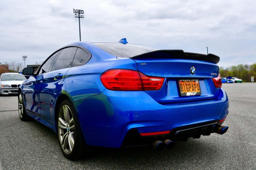 Side Rear View on a 2017 Blue BMW 440i GC