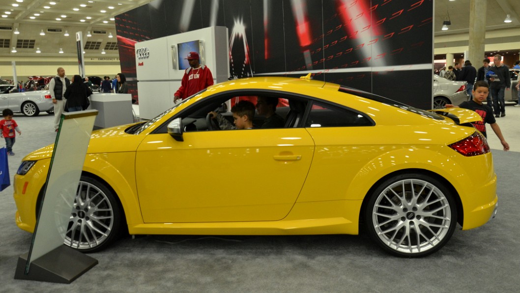 Malachi at the Helm of a 2016 Audi TTS in Bright Yellow Malachi at the Helm of a 2016 Audi TTS in Bright Yellow