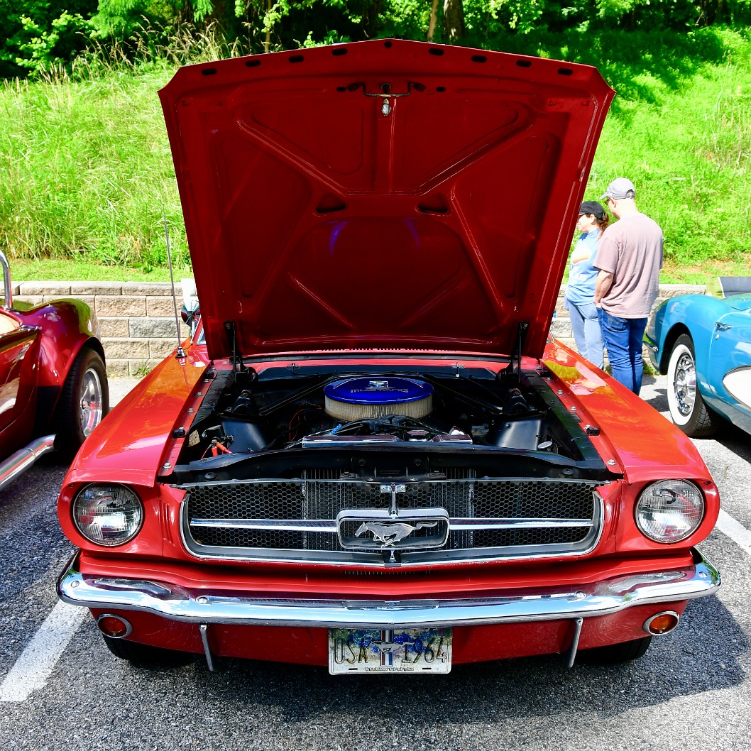 Trunk Open on a Red 1965 Ford Mustang