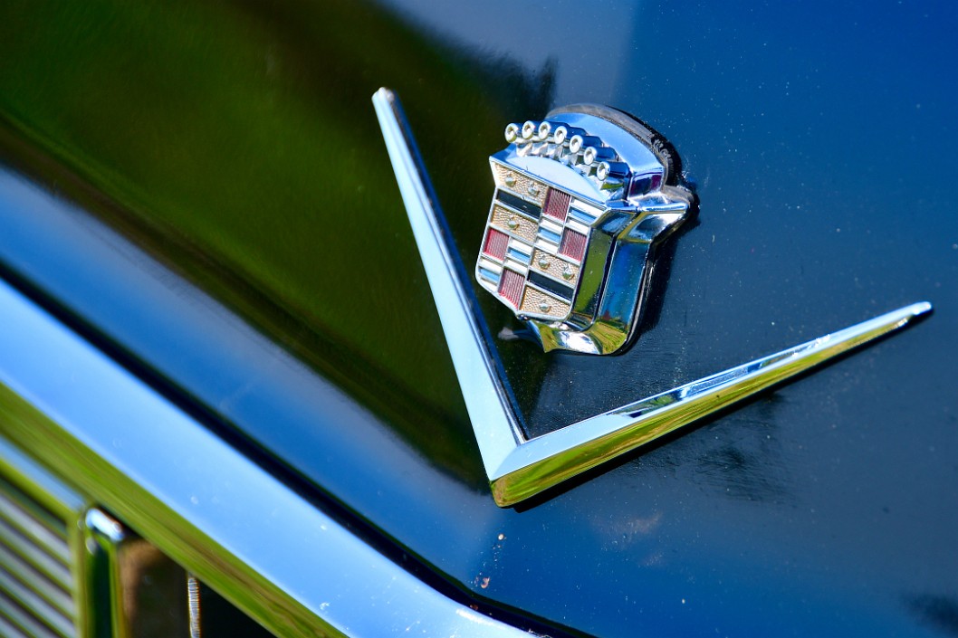 Badge and V